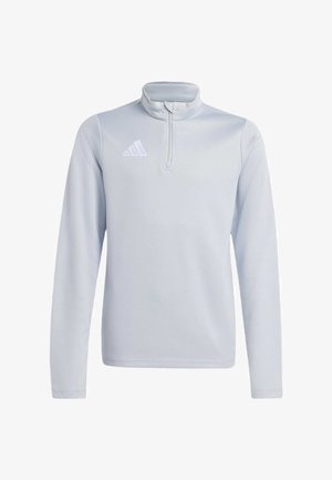 Jasnoszary sportowy pulower z długim rękawem, suwakiem do ćwiartki i białym logo Adidas na lewej piersi, pokazany na białym jednolitym tle.