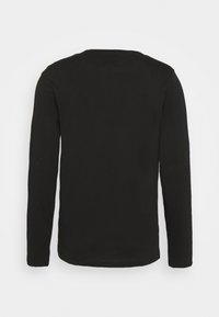 Maglietta nera a manica lunga in cotone, con scollo rotondo e un design semplice, senza decorazioni visibili o motivi.