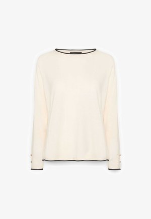 Top de manga larga color crema con escote redondo y ribete negro. Presenta detalles de botones en los puños, confeccionado en una tela suave y ligera.