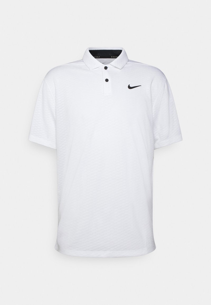 Polo de golf Nike blanc à manches courtes avec des boutons noirs et le logo Nike swoosh noir sur la poitrine gauche.