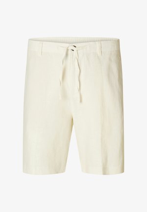 Shorts en lin de couleur crème clair, avec une taille à cordon de serrage et une coupe décontractée, en tissu lisse et texturé.