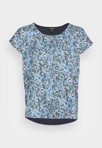 Top curto de manga curta com padrão floral azul, decote redondo e bainha em azul marinho. Tecido leve com um corte solto.