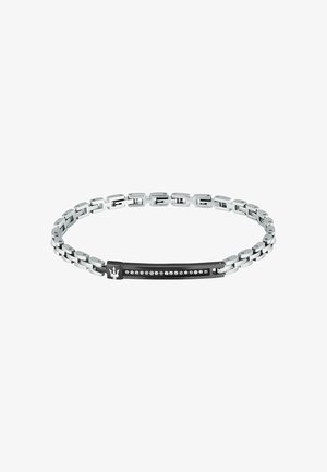 RVS kettingarmband met een zwart rechthoekig middenstuk, versierd met een rij kleine kristallen en een tridentlogo-accent.
