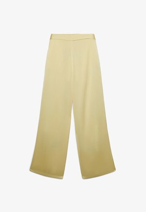 Pantalon à jambes larges en jaune pâle avec une ceinture lisse et sans fermetures visibles, présenté à plat sur fond blanc.