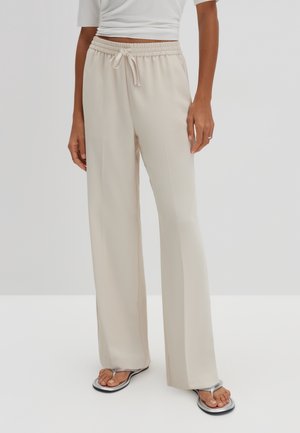 Spodnie materiałowe