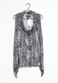 Ärmlös topp med en cowl-halsringning, som har ett svart och vitt ormtrycksmönster. Tyget är slätt med en lätt lyster. Hänger på en krok.