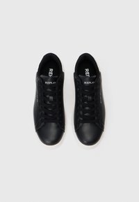 Black sneakers with a smooth leather finish, rounded toe, and black laces. Features white accents at the heel and "REPLAY" logo on the tongue.
