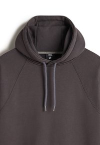 Dark gray hoodie with a large hood, raglan sleeves, and a drawstring in lighter gray. Features a label inside the neck area. Soft texture.