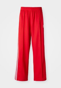 BAGGY - Pantalon de survêtement - better scarlet