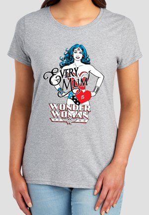 Graphic of Wonder Woman with blue hair and star-themed outfit, text reads "Every mum is Wonder Woman" on a gray t-shirt.