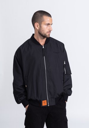 UNISEX - Kurzmantel - black