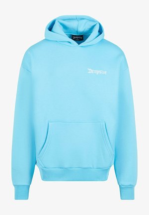 Light blue hoodie made of soft, textured fabric. Features a front pocket, ribbed cuffs, and a white logo text on the chest.