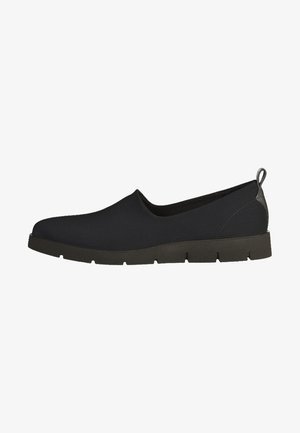 Zapato casual negro tipo mocasín con suela gruesa y lengüeta en el talón, diseñado para comodidad y fácil uso.