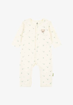 Baby-Strampler in Cremefarbe mit langen Ärmeln, grünem Kleeblattmuster, Druckknöpfen vorn und einem kleinen Teddygesicht-Patch auf der Brust.