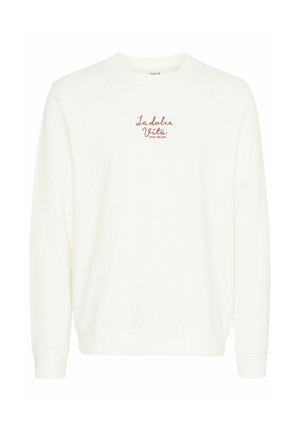 Baltas džemperis, pagamintas iš minkštos medžiagos, su ilgomis rankovėmis, apykakle ir raudona išsiuvinėta fraze "La Dolce Vita Cote d'Azur" ant krūtinės.