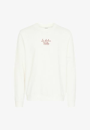 Valkoinen collegepaita, joka on valmistettu pehmeästä kankaasta. Siinä on pitkät hihat, pyöreä kaula-aukko ja rintaan kirjailtu teksti "La Dolce Vita Cote d'Azur" punaisella.