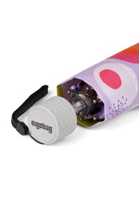 Ergobag umbrella with a purple and pink patterned canopy, a clear handle, and a textured white cap featuring the brand logo.