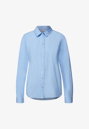 Vaaleansininen pitkähihainen nappikauluspaita, joka on valmistettu sileästä kankaasta. Siinä on klassinen kaulus, kuusi nappia ja käärityt hihat säädettävillä hihoilla.