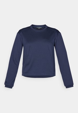 Mornarsko modra atletska majica z dolgimi rokavi, izdelana iz teksturiranega materiala, z okroglim izrezom in kontrastnimi ramenskimi paneli. Na prsih se ponaša z logotipom.
