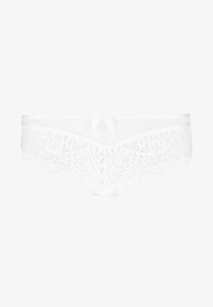 White lace panties featuring floral lace trim, dotted sheer material, and a front bow accent. Scalloped edges enhance the design.