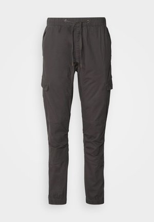 Pantaloni cargo neri realizzati in tessuto leggero, dotati di vita elastica con cordoncino, gamba affusolata e tasche laterali per riporre oggetti.