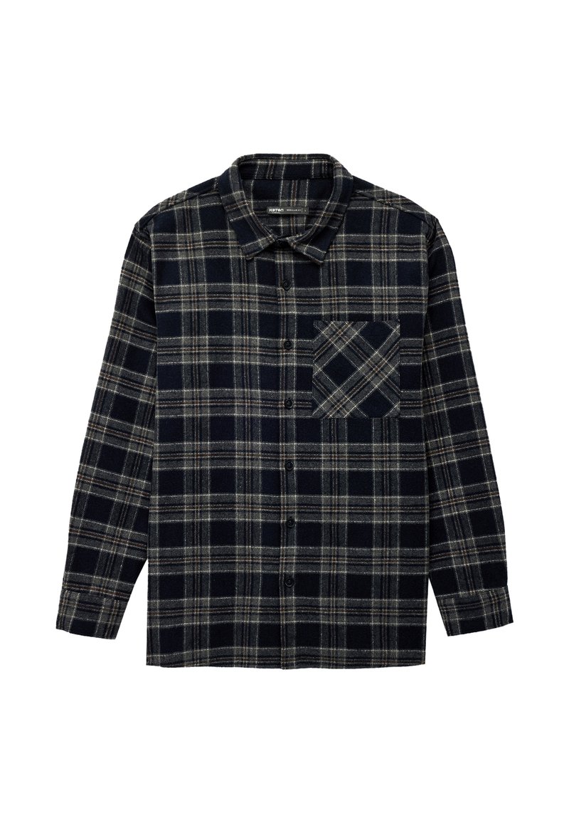 Koszula flanelowa zapinana na guziki w kratę w kolorach granatowym i beżowym. Posiada kołnierzyk, długie rękawy oraz kieszonkę na piersi w dopasowanym wzorze.
