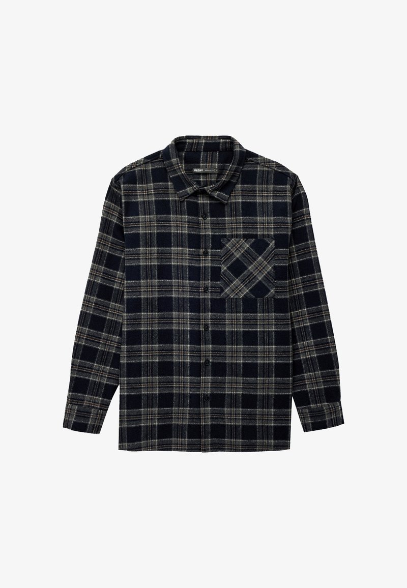 Koszula flanelowa zapinana na guziki w kratę w kolorach granatowym i beżowym. Posiada kołnierzyk, długie rękawy oraz kieszonkę na piersi w dopasowanym wzorze.
