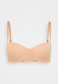 Nude push-up bra with padded cups, adjustable straps, and a smooth, seamless design. Features a hook-and-eye closure at the back.