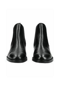 Bottes noires en cuir avec une finition lisse, panneaux latéraux élastiques et pointes arrondies. Semelle en caoutchouc plate avec un motif de semelle minimal.