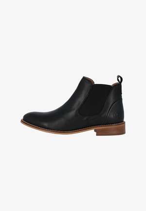 Botas Chelsea negras de cuero con paneles laterales elásticos, punta redonda y tacón de madera marrón. Presentan una tira en la parte trasera.