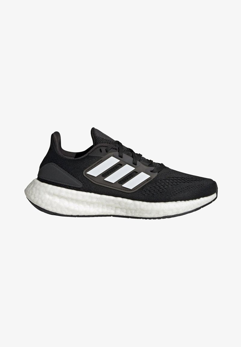 Black athletic shoe with a textured knit upper, featuring white three-stripe accents and a cushioned white midsole. Rubber outsole.