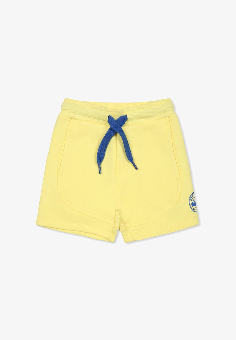 Pantaloni corti di cotone gialli con una coulisse blu, dotati di due tasche laterali e di una piccola etichetta con logo sul lato inferiore destro.