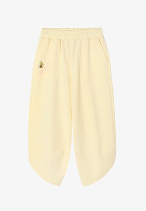 Šviesiai geltoni plataus kirpimo plačios kelnės su elastine juosmens juosta, priekiniams kišenėms su lopais ir mažąja bitės grafika su užrašu „let it bee“ ant kairės kišenės.