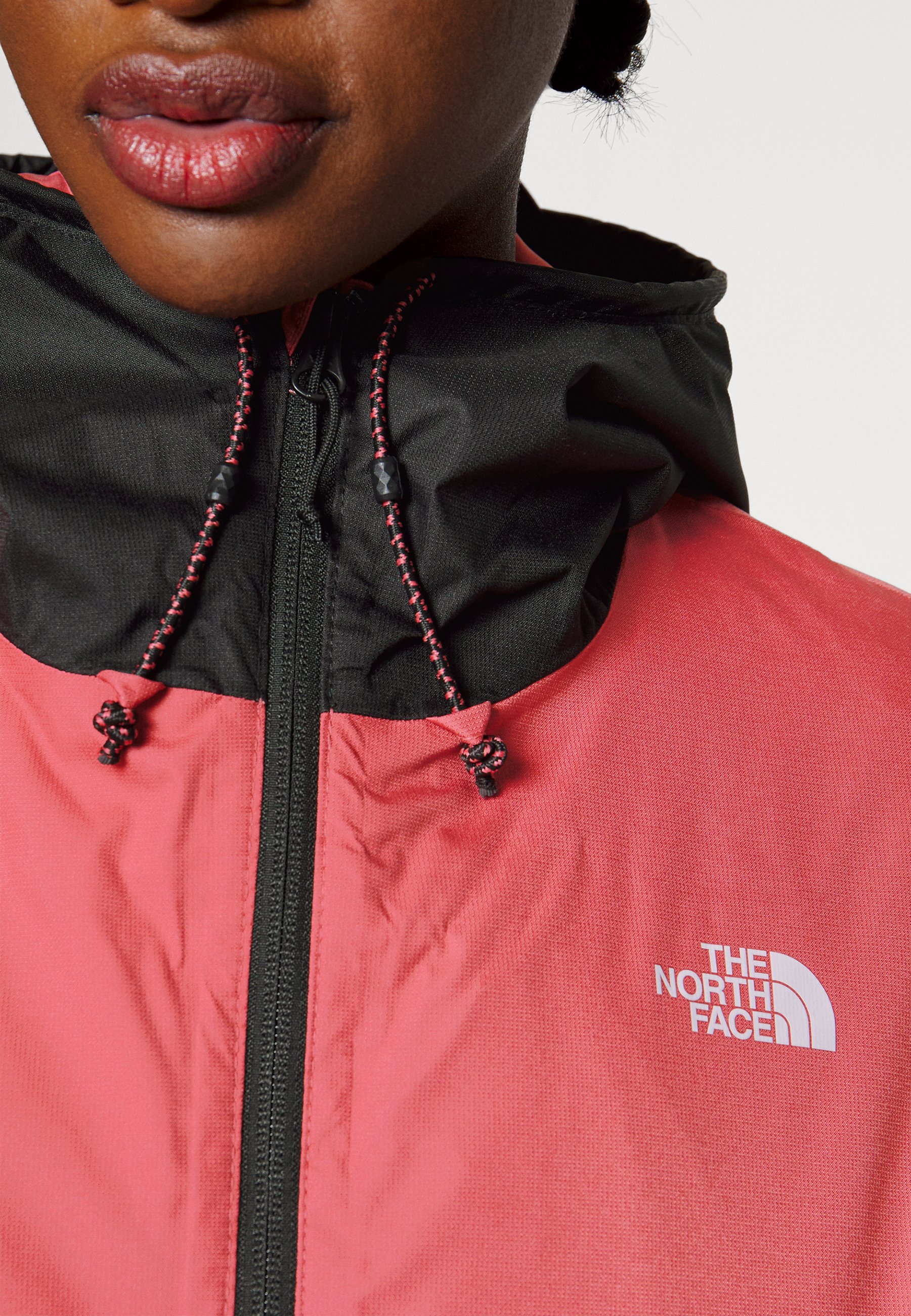 hot pink and black north face jacket