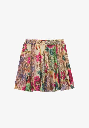 Jupe plissée multicolore avec ceinture élastique, présentant des motifs floraux et géométriques vibrants en rose, vert, violet et beige.