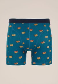 Férfi boxernadrág zöldeskék színben, ismétlődő hot dog mintával. Kék rugalmas derékpánttal. Puha pamut anyag, kényelmes viselettel.