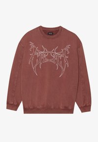 Sudadera oversize marrón de algodón, con un diseño gráfico blanco en la parte delantera y puños y dobladillo acanalados.