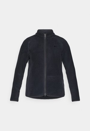 Fleecejacke in dunkelblau, mit hohem Kragen, durchgehendem Reißverschluss und dezentem Logo auf der Brust. Glatte Textur mit zwei seitlichen Taschen.