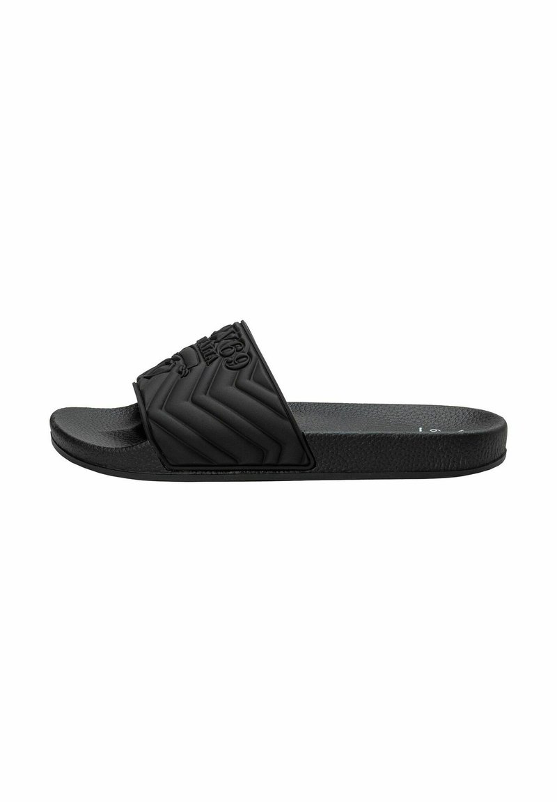 Black slide sandal featuring a textured rubber strap with a zigzag pattern and a smooth sole, designed for casual wear.