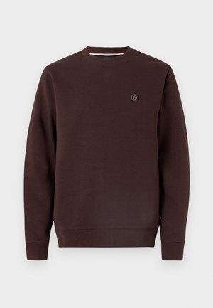 Sweat-shirt à manches longues de couleur brun foncé avec col rond, poignets et ourlet côtelés, avec un petit logo rond noir sur la poitrine gauche.