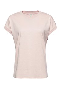 T-shirt en coton rose clair à manches courtes avec col rond et coutures visibles aux manches et au col.