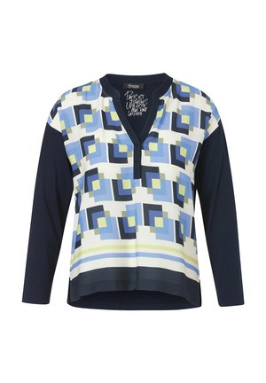 Langärmelige Bluse mit marineblauen Ärmeln, geometrischen blauen und gelben quadratischen Mustern vorne, einem V-Ausschnitt und rundem Kragen.
