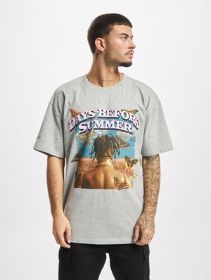 Gray cotton T-shirt featuring a large colorful graphic with butterflies and the text "DAYS BEFORE SUMMER." Loose fit with short sleeves.