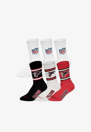 Weiße Crew-Socken mit NFL-Logo und schwarze, weiße und rote Atlanta Falcons-Socken mit Teamlogo und Namen in fetten Buchstaben.