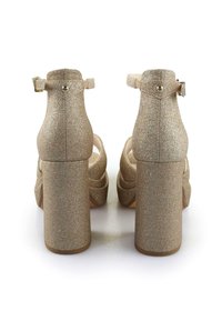 Buffalo Sandali z visoko peto - gold