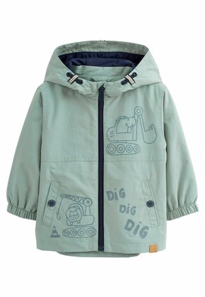 Veste légère vert clair pour enfants avec capuche, poignets élastiques, intérieur bleu marine, et motifs d'excavatrice grise avec le texte "DIG". Deux poches avant.