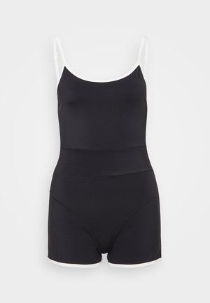 Zwarte zwemoutfit met verstelbare spaghettibandjes, een gladde textuur en contrasterende witte accenten langs de randen. Heeft een aansluitend ontwerp en shorts.