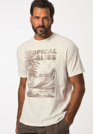 Short-sleeve cream t-shirt featuring a brown graphic of palm trees and mountains with "TROPICAL BLISS" text in a bold font.