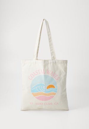 Canvas tote bag with long handles, featuring a pastel design of waves, sun, and text "Coastal Waves 97 Surf Club CA".
