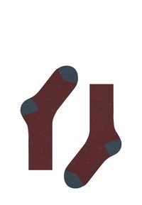 Chaussettes bourgogne à pois bleus avec des poignets contrastants bleus. Nom de la marque "FALKE" affiché près de la cheville.